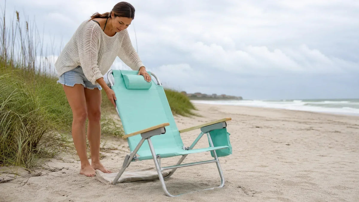 Woman relaxing in a supportive beach chair by the shore