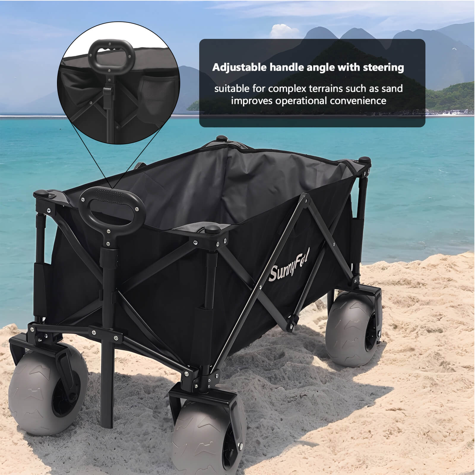 Black folding wagon with adjustable handle on a sandy beach with ocean and mountains in the background.