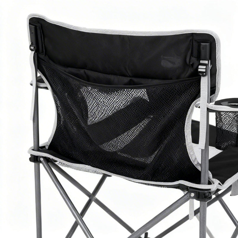 Black mesh backrest on a camping chair with a white background