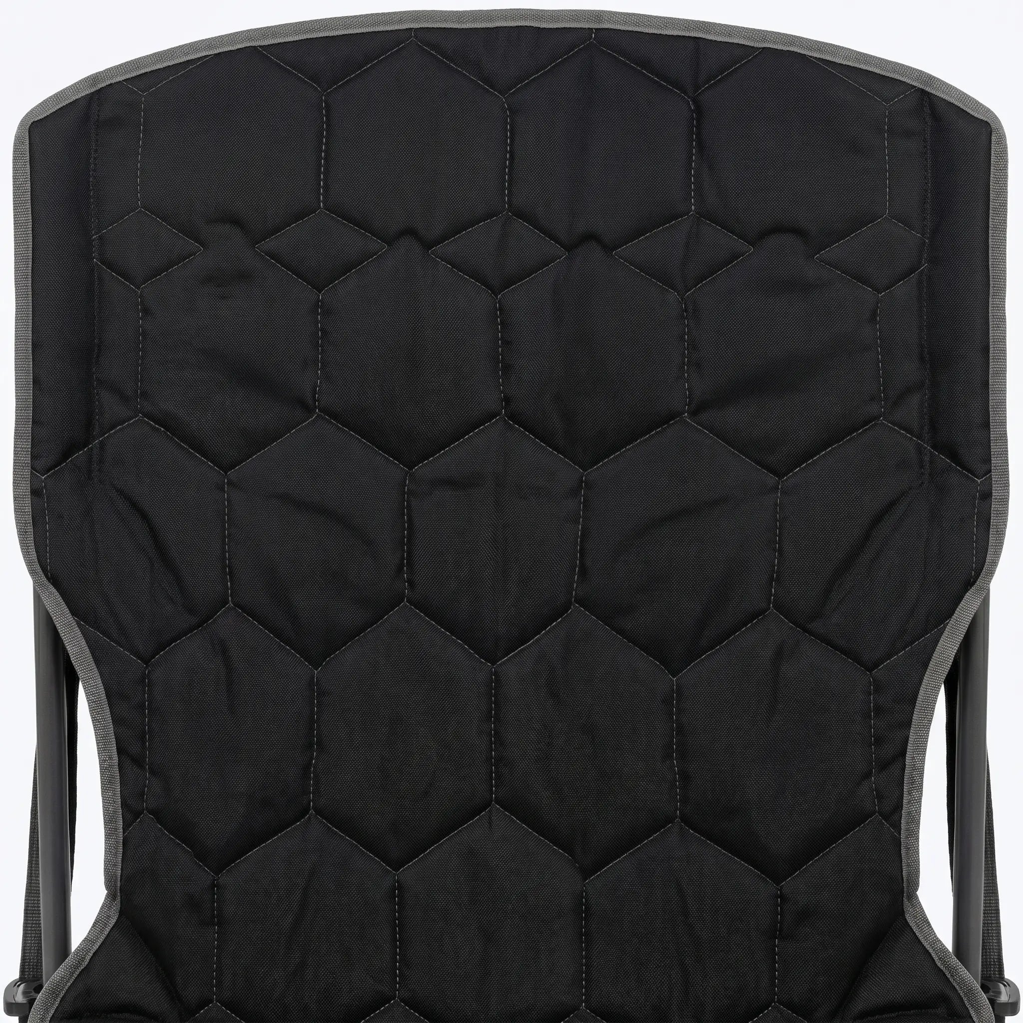 Black quilted chair back on a white background