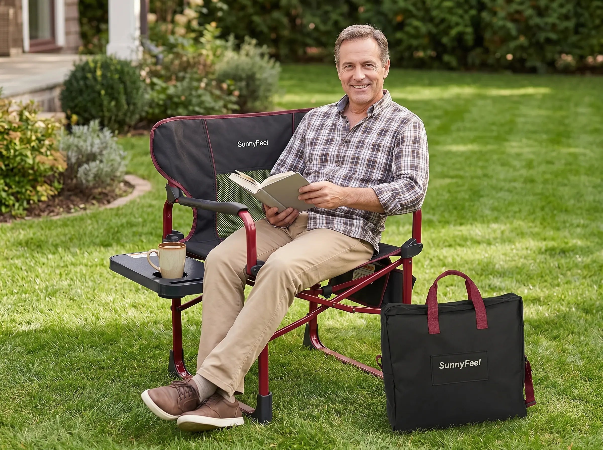 Man sitting on a Sunnyfeel chair in a garden with a book and a bag next to him.