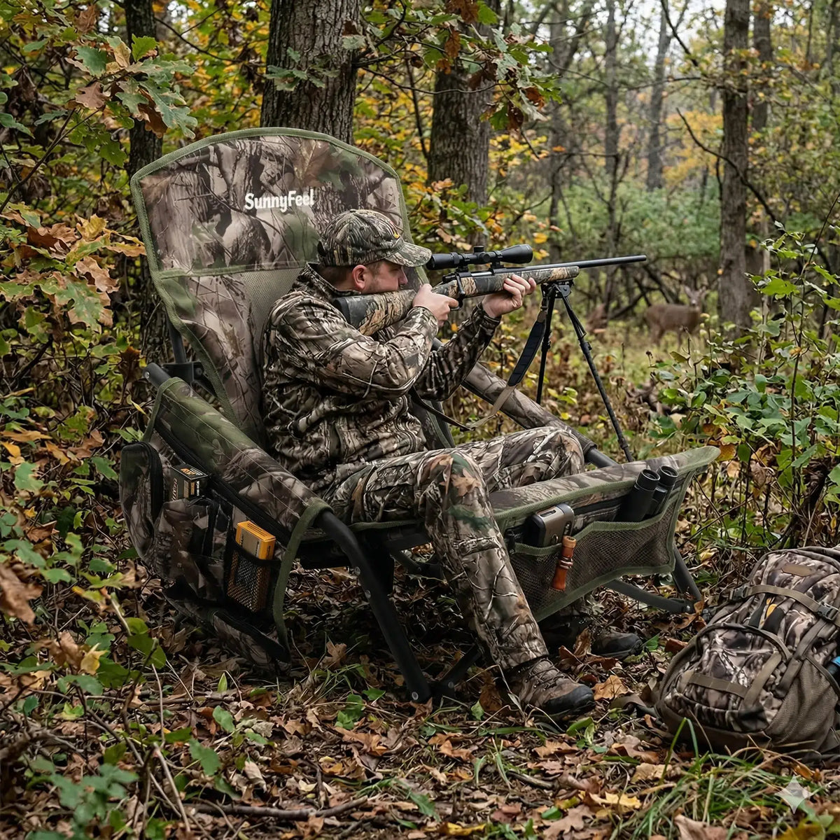 Hunter in camouflage gear using a bow in a forest setting with a SunnyFood branded chair.