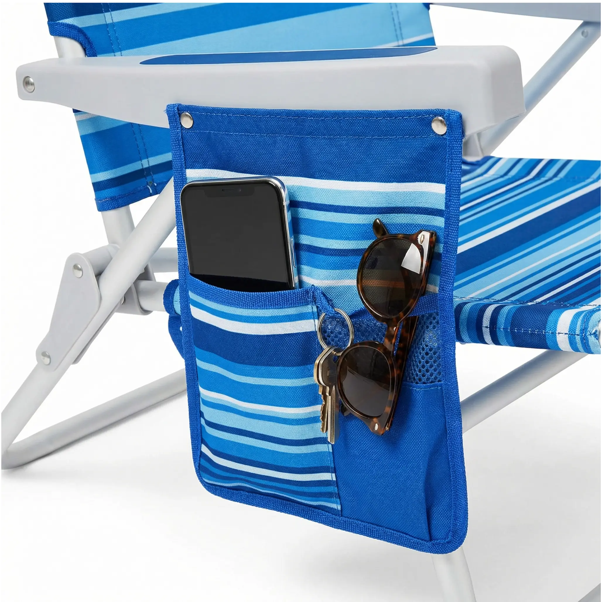 Blue striped chair with a pocket holding a phone, sunglasses, and keys on a white background