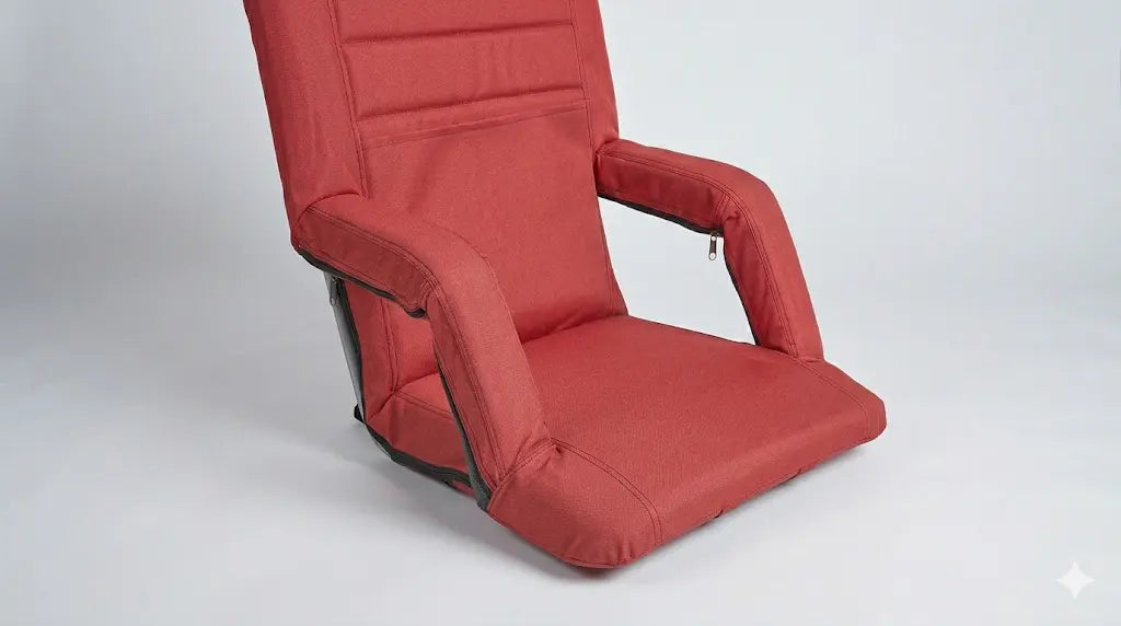 Red cushioned chair on a white background