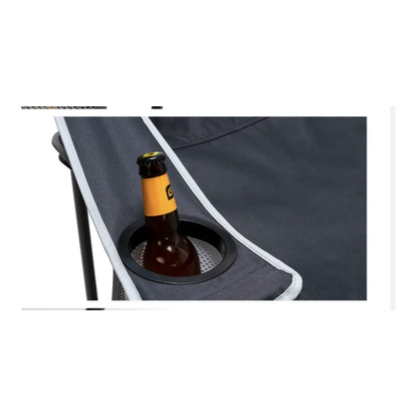 Beer bottle in a cup holder of a folding chair with a white background