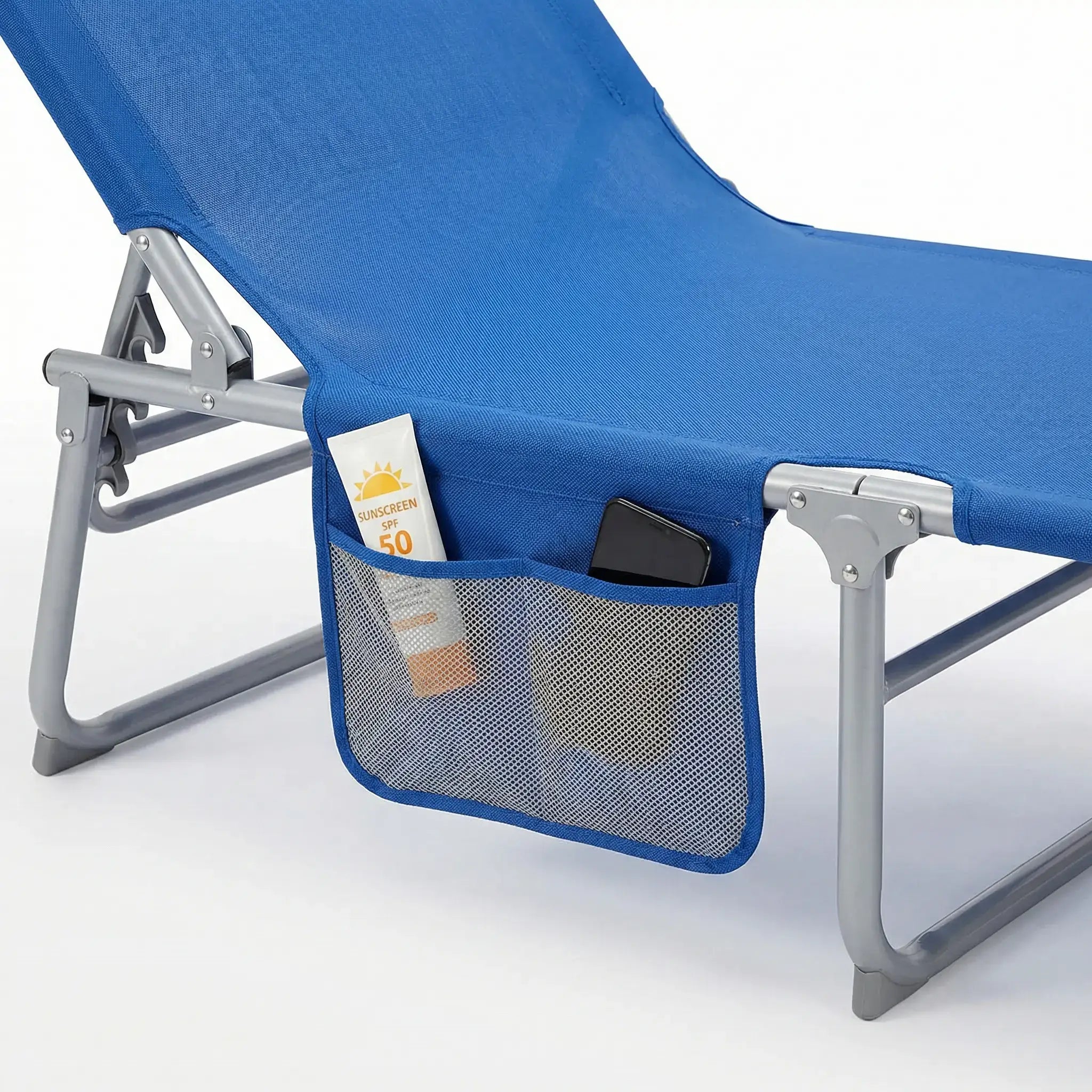 Blue lounge chair with a mesh pocket holding sunscreen and a phone on a white background