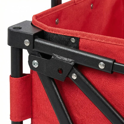 Close-up of a red folding chair with black metal frame on a white background